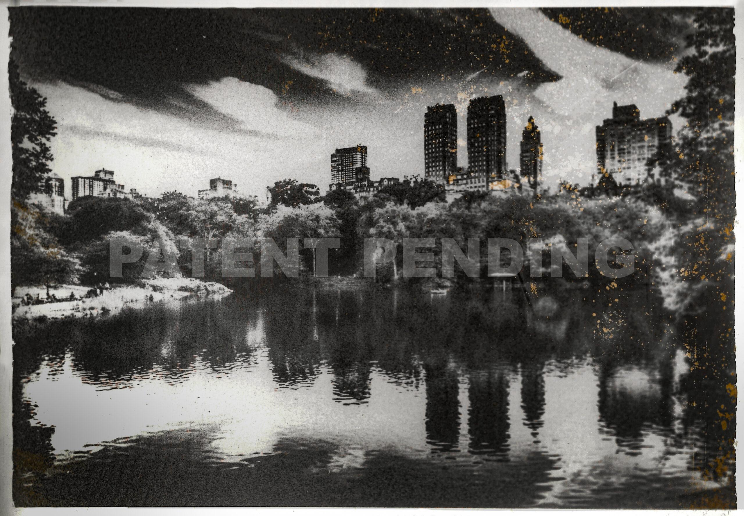 Silhouette of New York with skyscrapers on the background that reflects on the water of Central Park. high grain Black and white chemical development of digital image with drops of development reagent